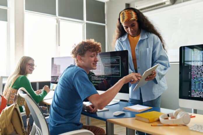 Students learning IT at school high speed internet in schools
