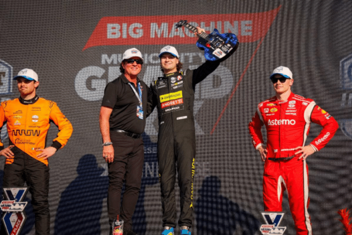 MCGP_Podium Second place finisher Pato O'Ward, Scott Borchetta with race winner and Nashville resident Colton Herta and third place finisher and Nashville native, Josef Newgarden at the Big Machine Music City Grand Prix Presented by Gainbridge® on Sunday, September 15, 2024.