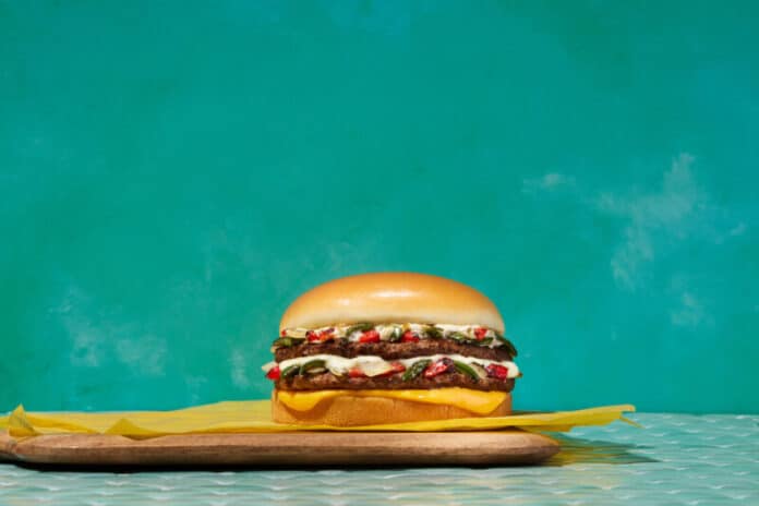 Photo of the Monterey Melt on a cutting board with teal background.