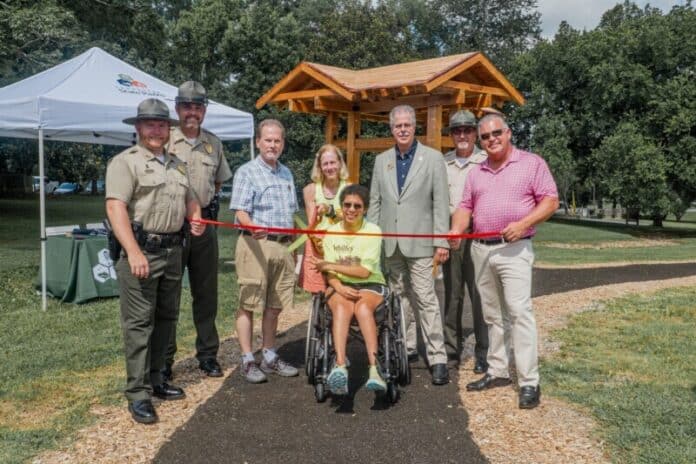 L-R: Henry Horton State Park Manager Shaun Rainone, Tennessee State Parks Area Manager Jacob Young, Sen. Joey Hensley, Amy Harris, Said Harris, TDEC Deputy Commissioner Greer Tidwell, Tennessee State Parks Director of Operations Kim Moore, and Rep. Todd Warner.