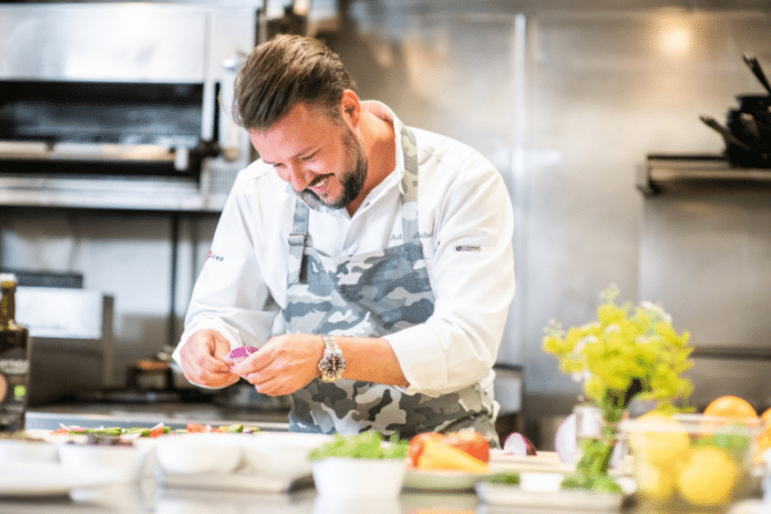 Adam Sobel Kitchen Headshot 2025
